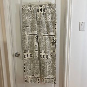 Zara newspaper print pants